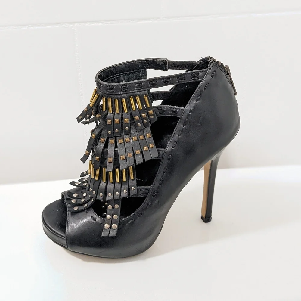 Leather heels by Aldo